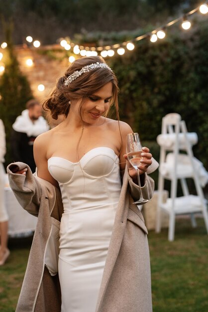 Cheerful young bride at a banquet