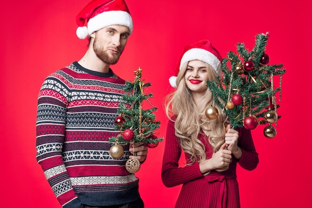 Cheerful young couple christmas decoration holiday lifestyle