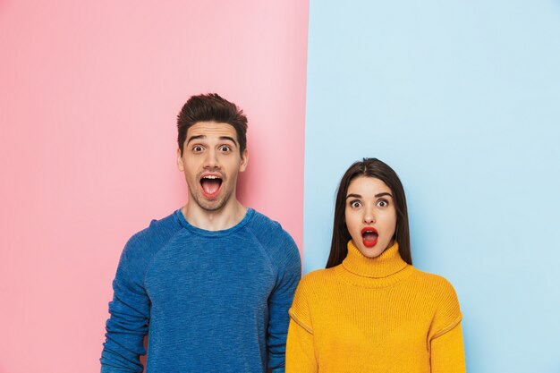 Cheerful young couple standing