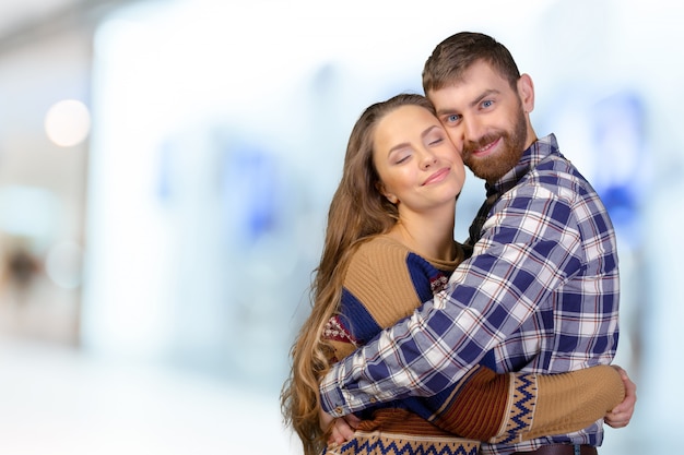 Cheerful young couple standing