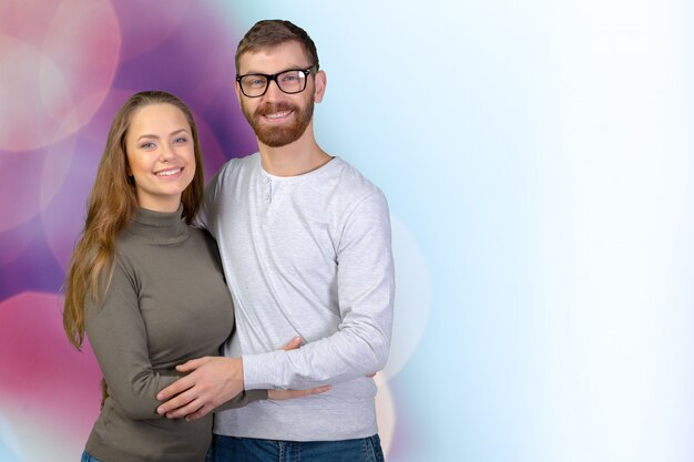 Cheerful young couple standing