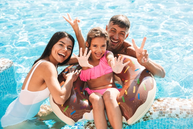 Cheerful young family having fun together