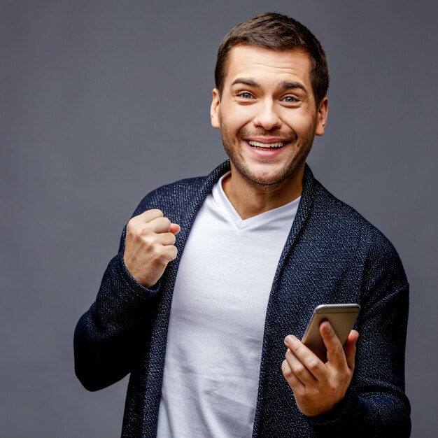 Cheerful young man in smart casual wear