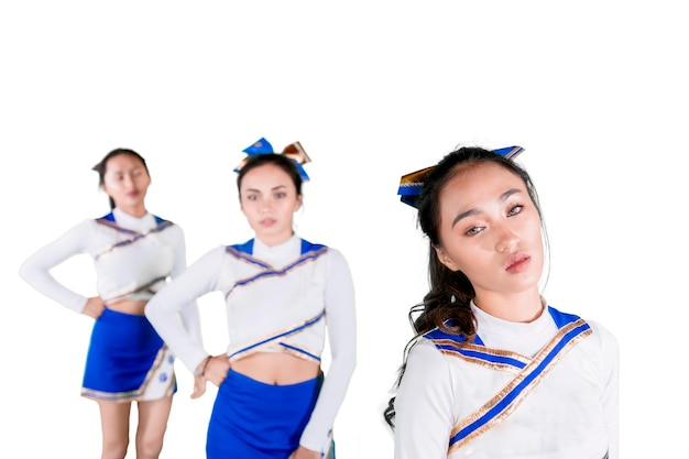 Cheerleading team standing together in the studio