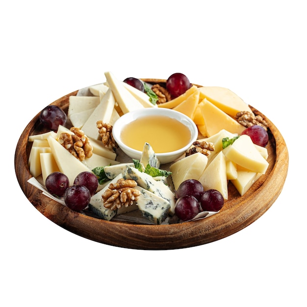 Cheese appetizer platter with grapes and honey