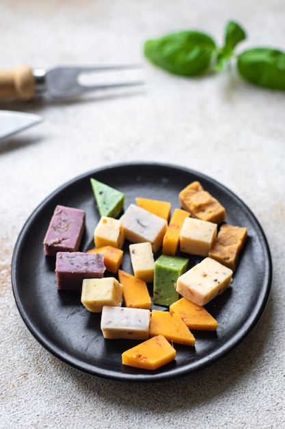 cheese assortment aged cheeses basil lavender fenugreek chili baked milk turmeric carrot