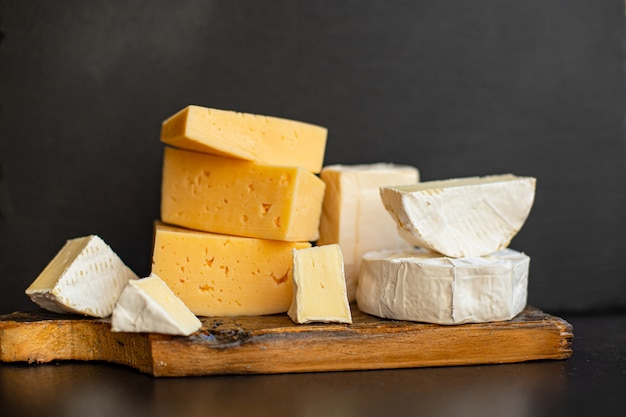 Cheese assortment of different types of hard and soft cheeses