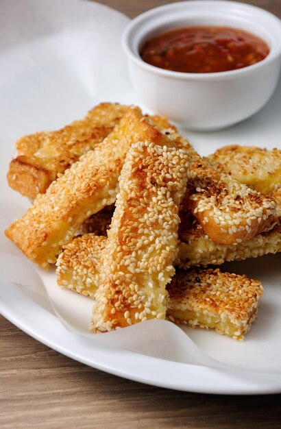 Cheese bread sticks in sesame