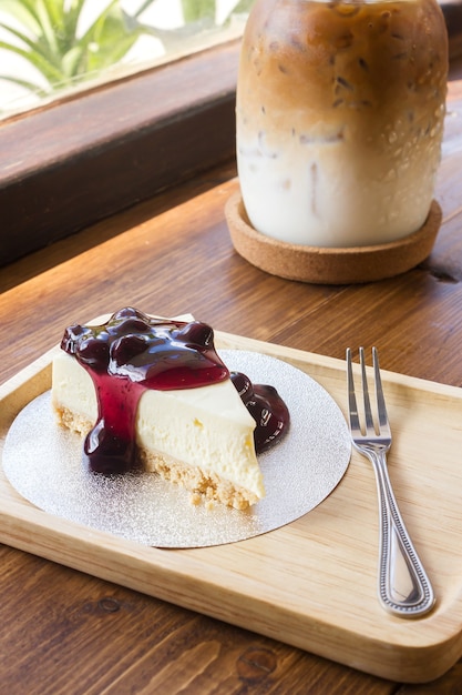 Photo cheese cake served with ice coffee.