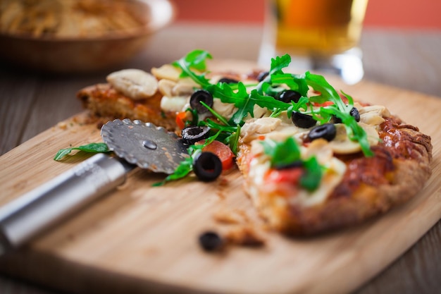 Cheese and Champignon Pizza on Wooden Board