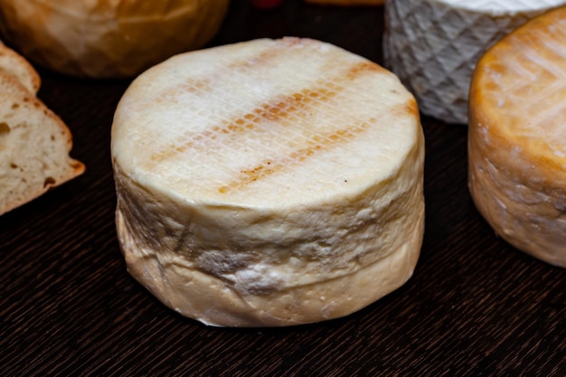 Cheese collection, variety of cheeses made in the Canary Islands served on a wooden board