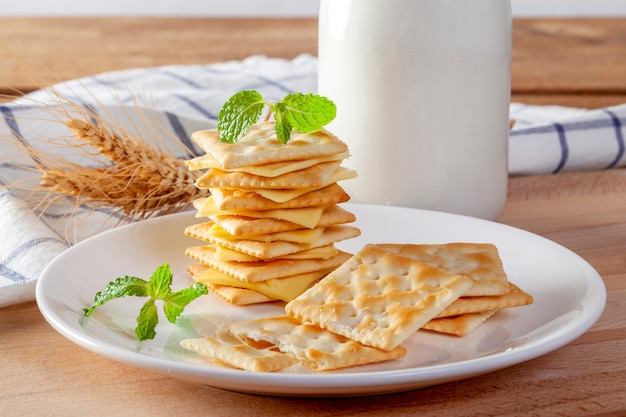 Cheese and crackers with fresh milk