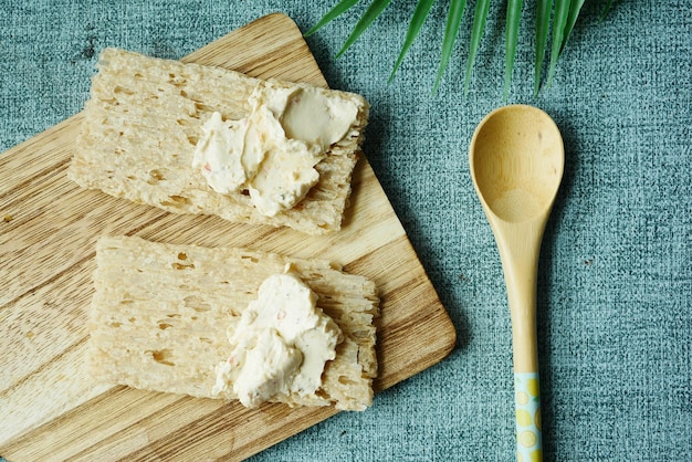 Cheese cream spread crackers on table