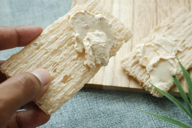 Cheese cream spread crackers on table