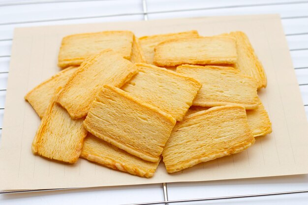 Cheese crispies on stainless steel cooling rack