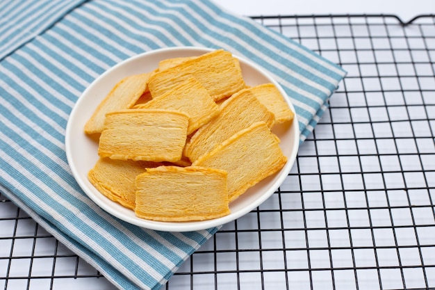 Cheese crispies on white plate