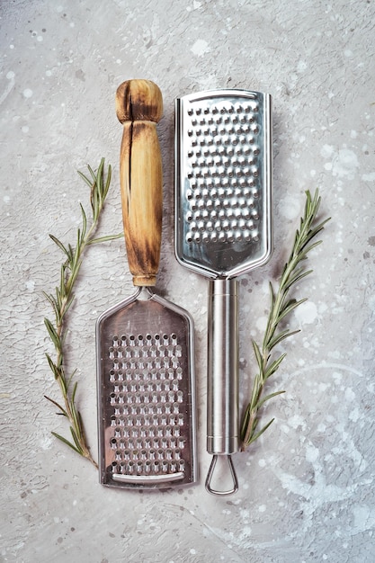 Cheese grater on a stone background Kitchen utensils Free space for text