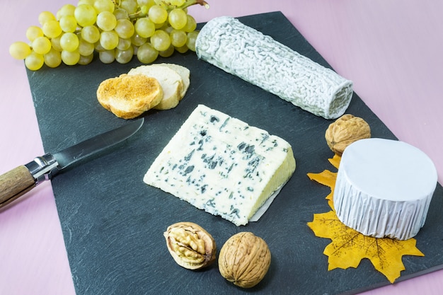 Cheese platter with grapes