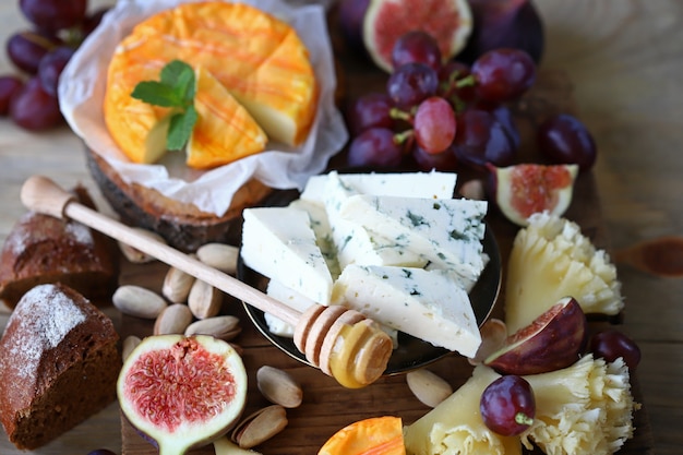 Cheese set with fruits and nuts