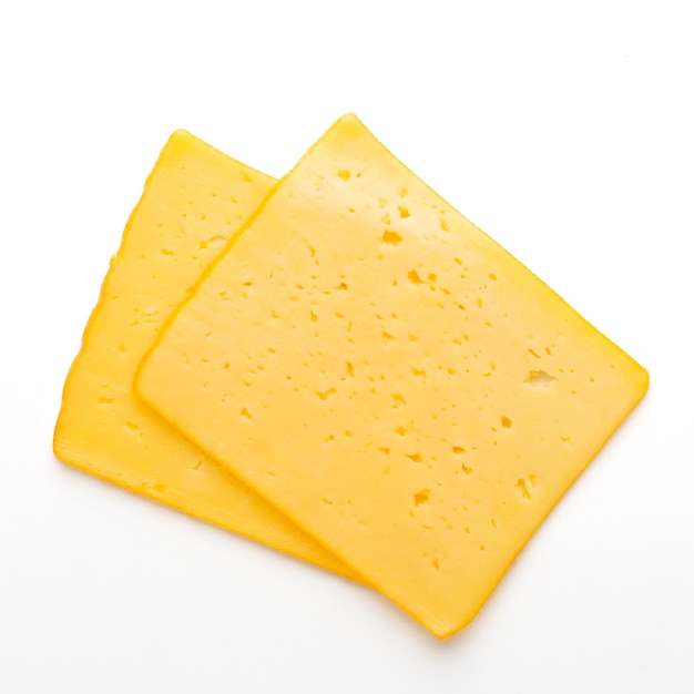 Cheese slice isolated on white. top view