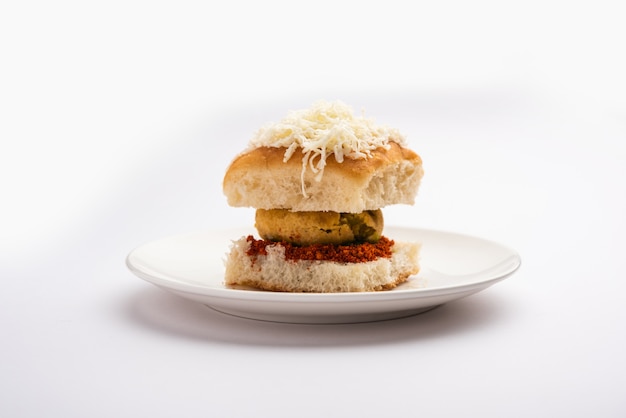 Cheese Vada pav or Grated cheese Wada Pao, popular Bombay snack food