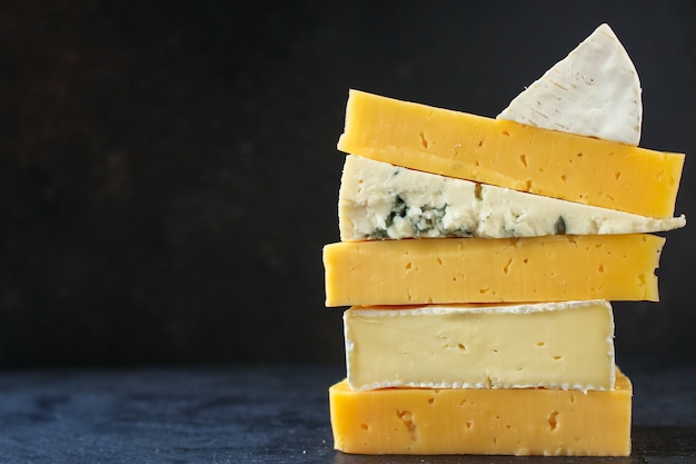 Cheese variety (delicious snack, different types of hard and soft cheese)