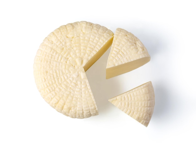 分離した白い背景の上のチーズ ホイール