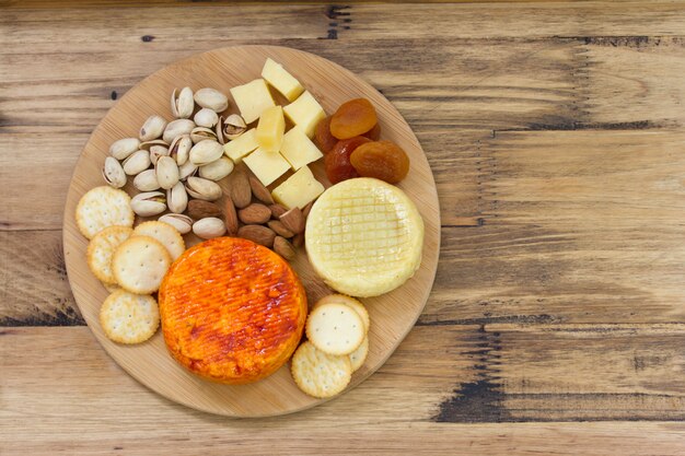 Cheese with nuts and cookies