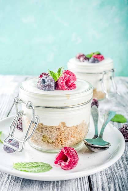 Cheesecake in portioned jars with summer berries