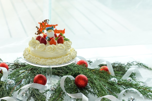 Cheesecake served with Christmas decorations.