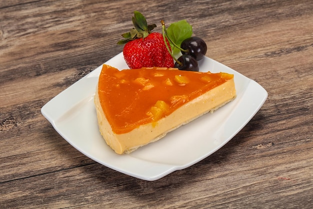 Cheesecake with apricot served strawberry