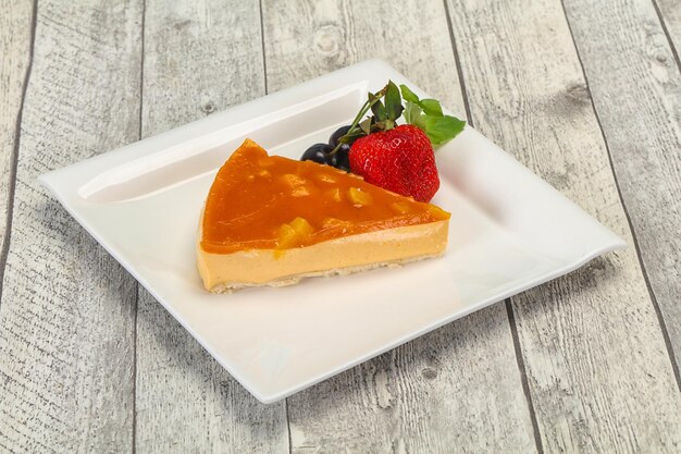 Cheesecake with apricot served strawberry