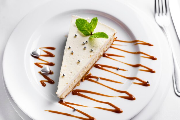 Cheesecake with mint leaves