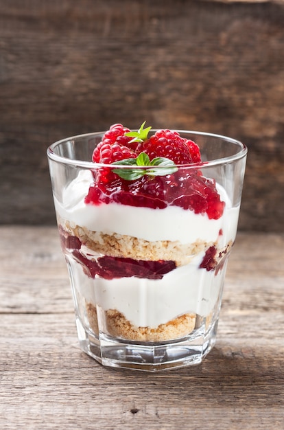 Cheesecake with raspberries in a glass