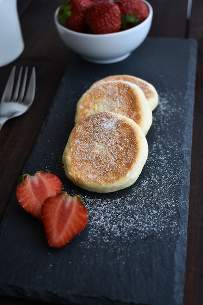 Cheesecakes with coconut and strawberry