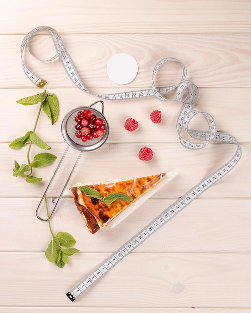 Cheesecakes with raspberries On a white wooden background Dietary food