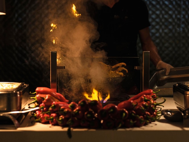 A chef cooking at a hotel buffet