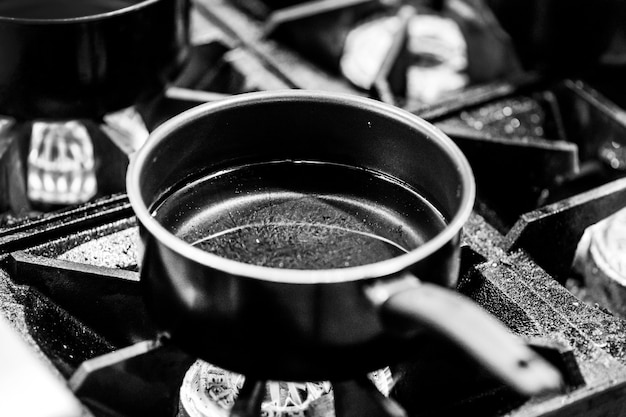 Chef cooking in a kitchen, chef at work, Black and White
