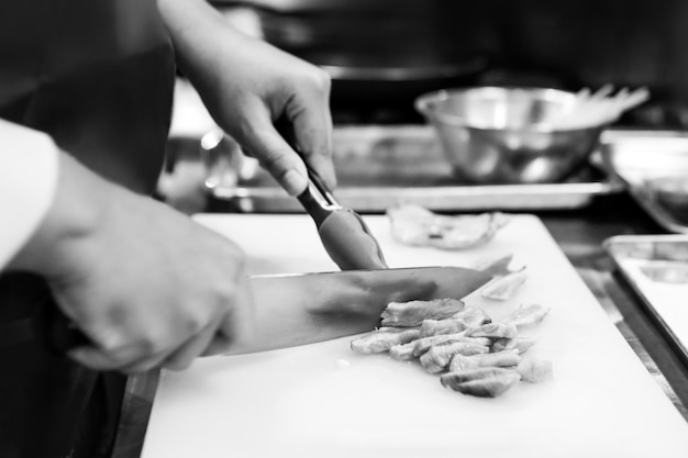 Photo chef cooking in a kitchen