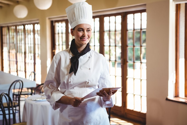 Chef holding a document