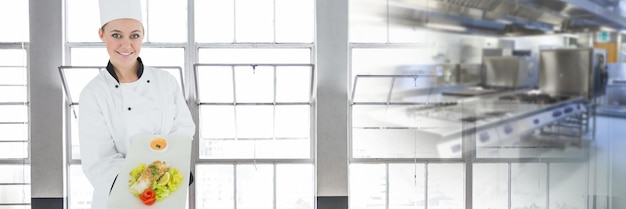 Chef holding food with blurred kitchen background