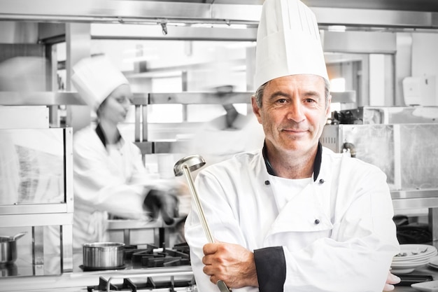 Chef holding ladle