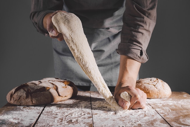 Chef making fresh dough for baking