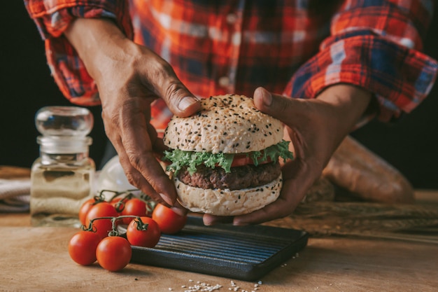 Chef making hamburger homemade.