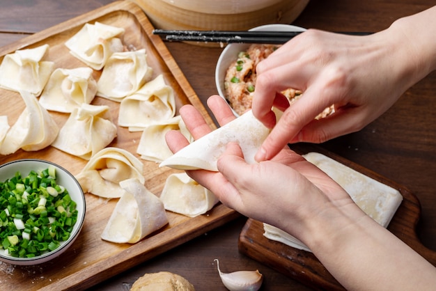 chef making meat wonton