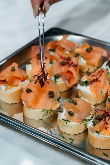 chef plate with salmon breads