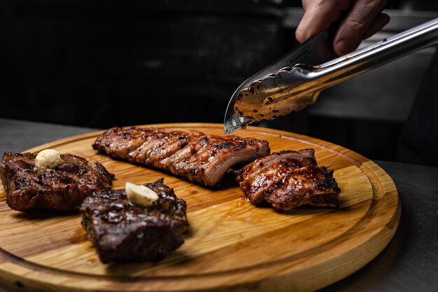 the chef prepares the meat. Close-up