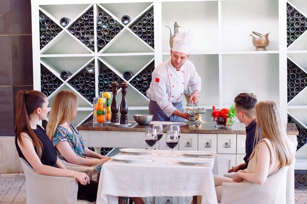 The chef prepares the paste for the visitors.