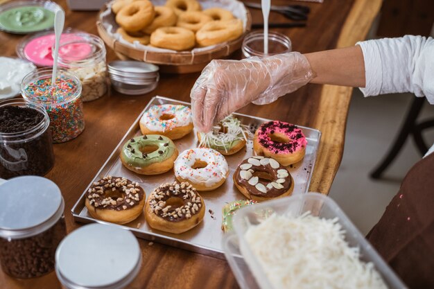 Chef preparing donuts in the kitchen