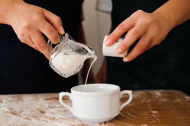 Chef preparing dough. cooking process, work with flour. 